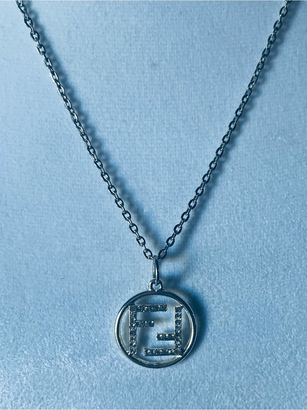 Silver Luxury “FF” Medallion on Silver Chain